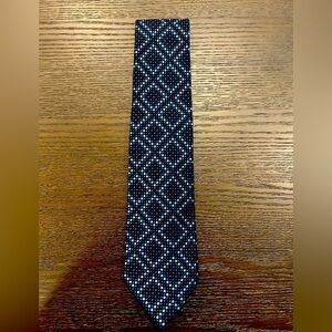 Express mens blue tie with a repeating geometric diamond pattern sophisticated